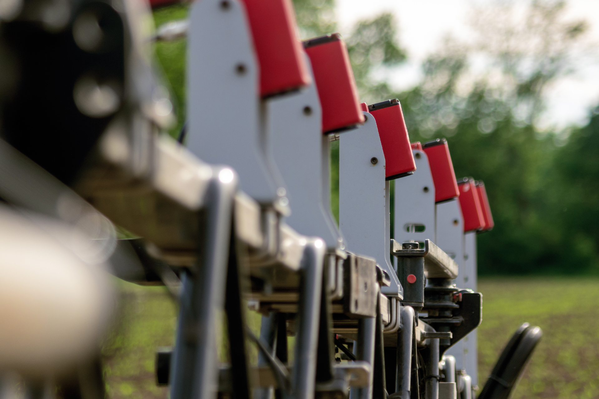 WeedEye FALCON vision camera units mounted in a row along the spray boom